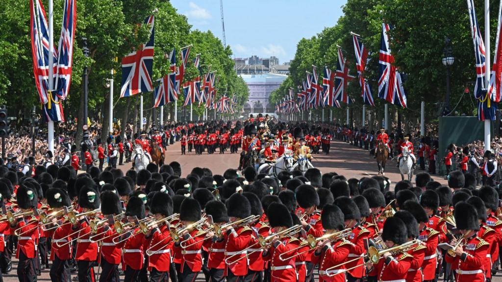 King Charles III in procession down the Mall after Trooping the Colour 2025