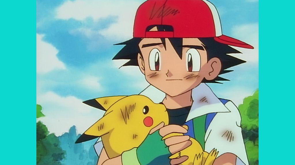 ash cuddles pikachu.