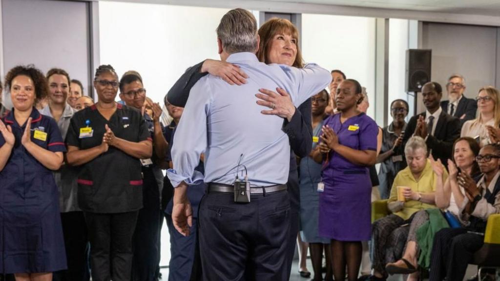 Starmer hugging Reeves.