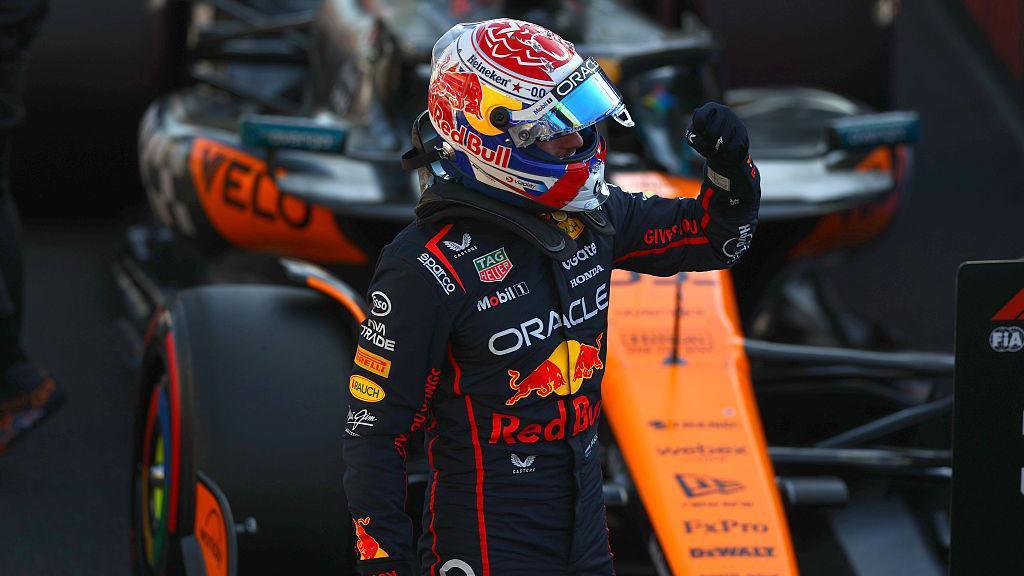 Max Verstappen clenches his left fist in celebration after taking pole position for the Italian Grand Prix
