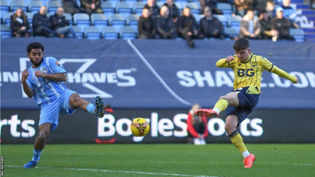 Tyler Goodrham (right) scores at Coventry