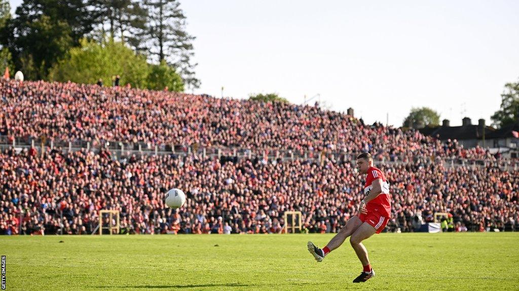 The fans watch on as McFaul kicks Derry to successive Ulster titles