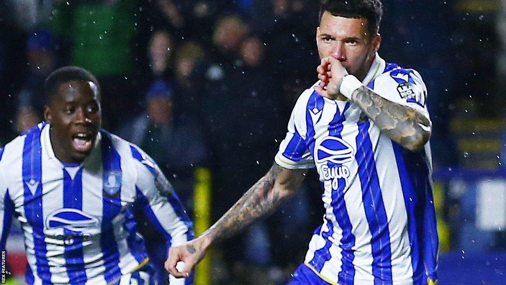 Marvin Johnson (right) in action for Sheffield Wednesday