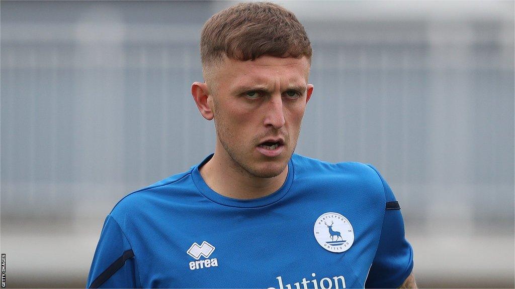 Oliver Finney warms up in Hartlepool's pre-match preparations