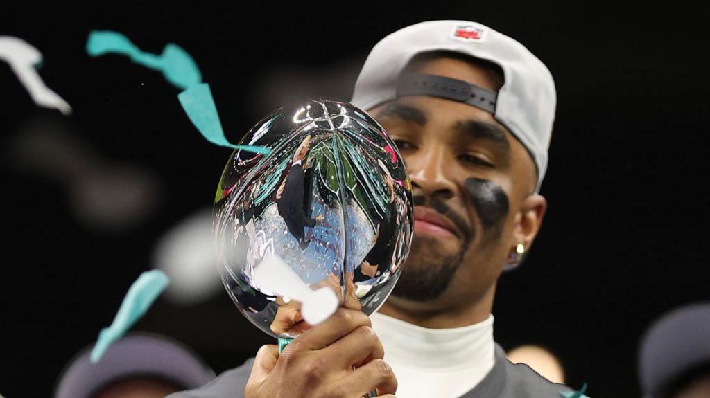 C.J. Gardner-Johnson #8 of the Philadelphia Eagles celebrates in confetti after beating the Kansas City Chiefs