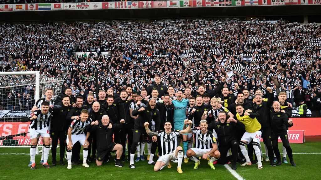 Newcastle players pose for a picture after winning against Sunderland in 2014