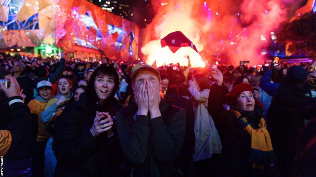 Fans at Melbourne's Federation Square watch the Matildas' quarter-final against France