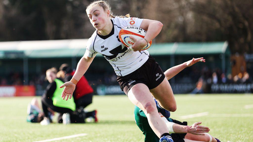 Millie David scores a try