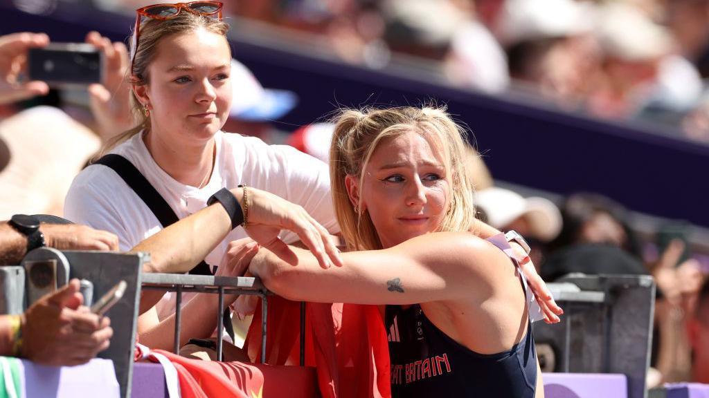 Molly Caudery is consoled after missing out on the Olympic final in Paris