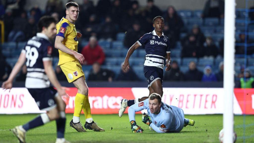 Ra'ees Bangura-Williams scores Millwall's third goal of the night