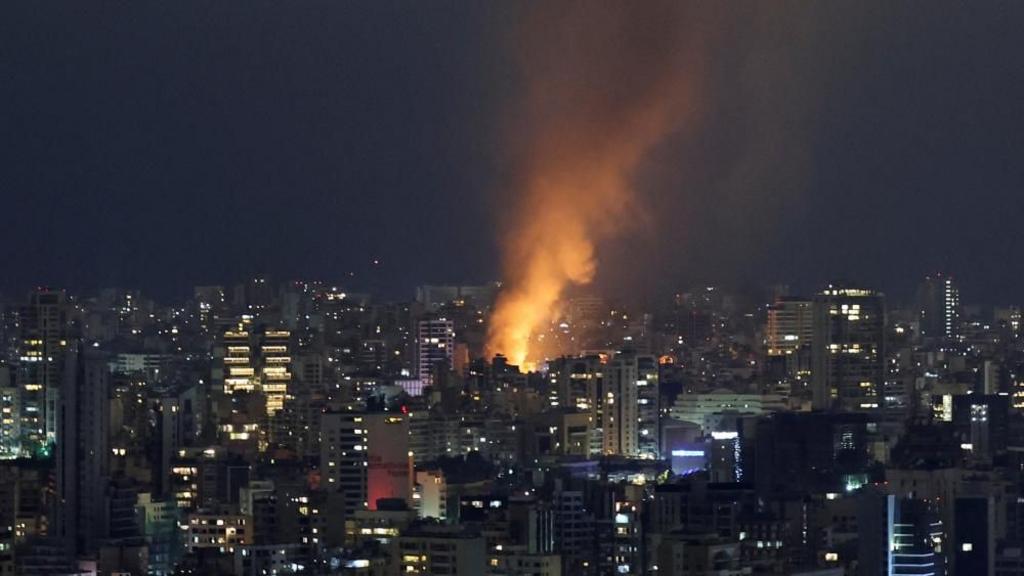 Smoke and fire rise over Beirut, after Israeli air strikes, amid ongoing hostilities between Hezbollah and Israeli forces, as seen from Sin El Fil, Lebanon, October 10, 2024.