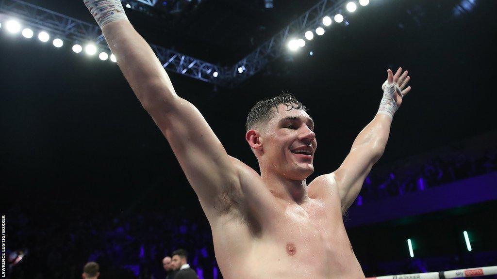 Chris Billam-Smith celebrates in the ring