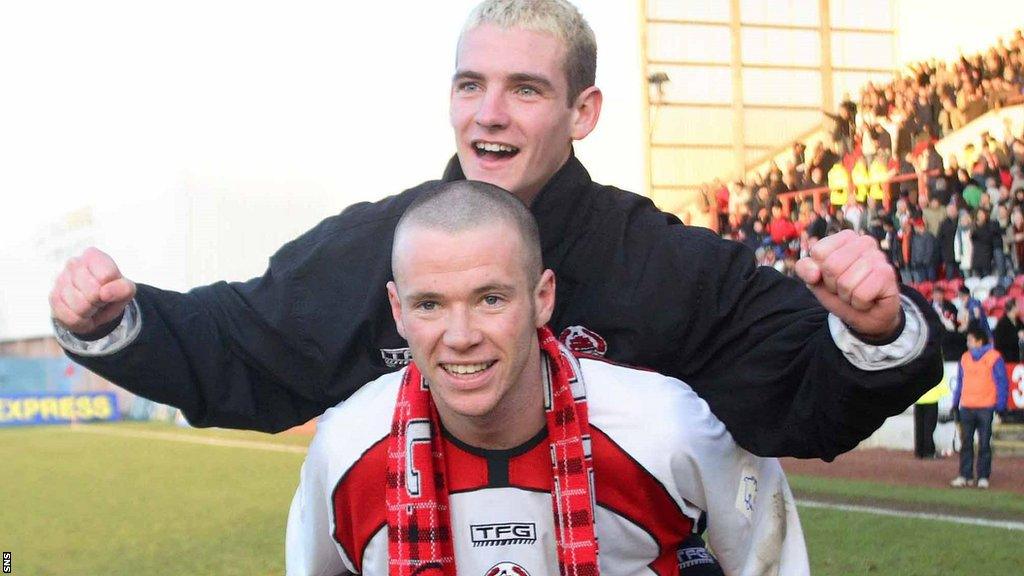 Eddie Malone and Craig Bryson celebrate