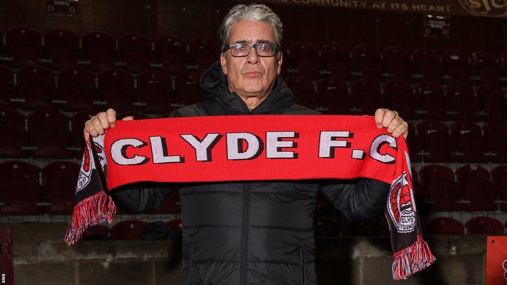 Clyde manager Ian McCall with a club scarf