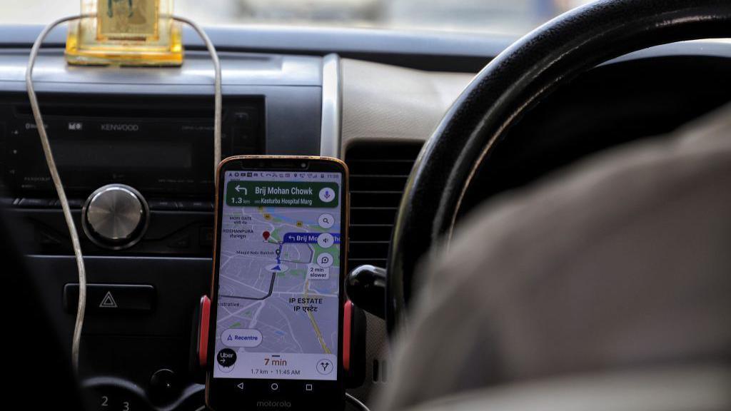 A driver uses Google Maps during a ride in New Delhi India amid Covid-19 Coronavirus Pandemic on 07 March 2021 (Photo by Nasir Kachroo/NurPhoto via Getty Images)