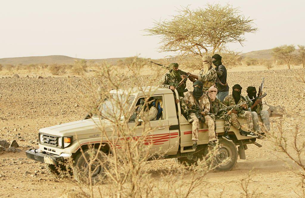 Armed, masked men in a pick-up truck in northern Mali