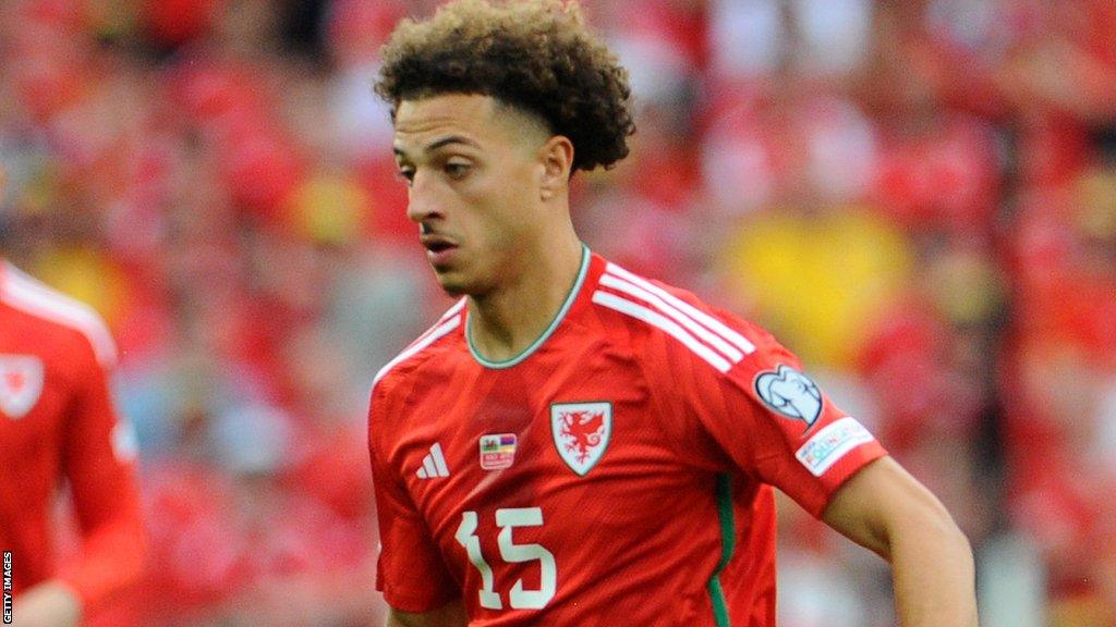 Ethan Ampadu playing for Wales