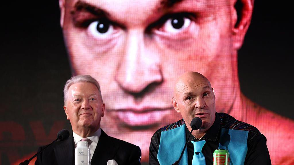 Another of Warren's boxers, Tyson Fury (right), makes his comeback against Arslanbek Makhmudov on Saturday. That fight is being shown live on Netflix