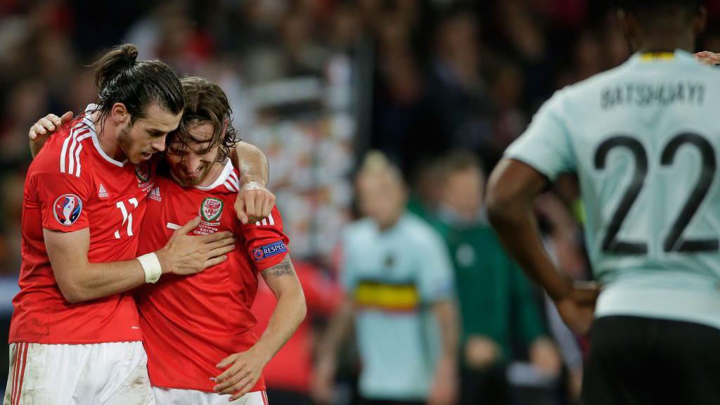 Gareth Bale and Joe Allen celebrate during Wales' win over Belgium at Euro 2016