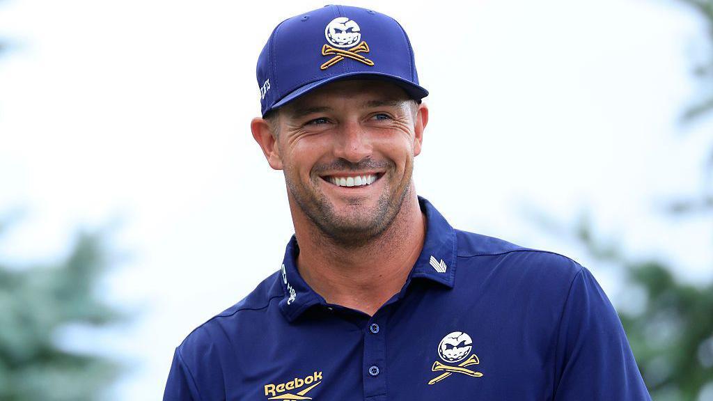 Bryson DeChambeau smiles while competing at the LIV Golf Indianapolis event