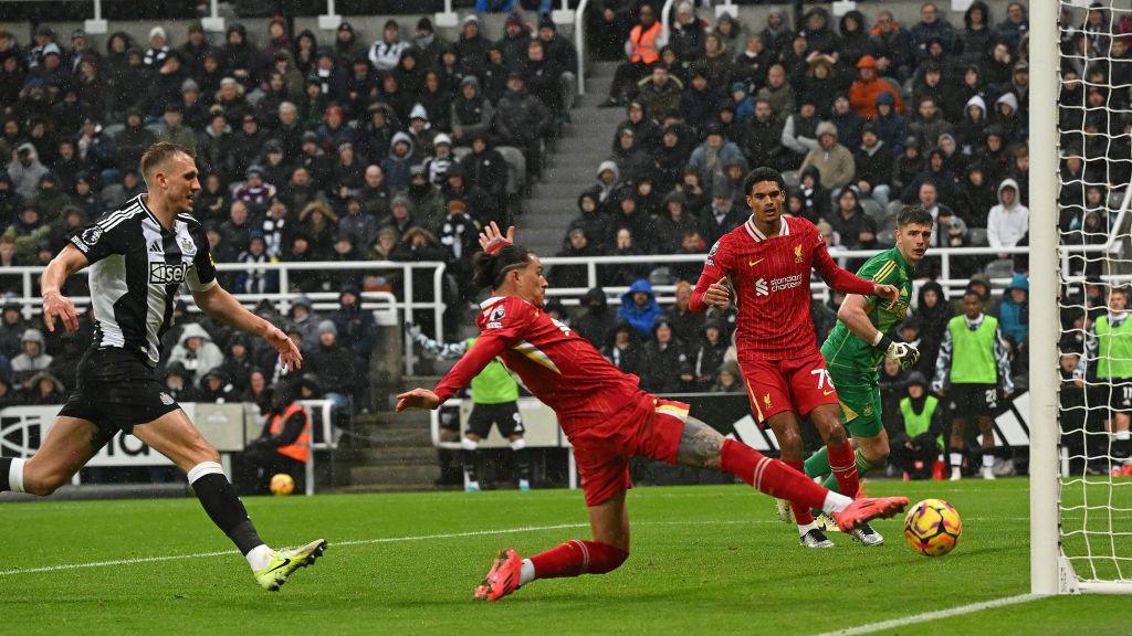 A stretching Darwin Nunez fails to score from close range for Liverpool against Newcastle in December 2024