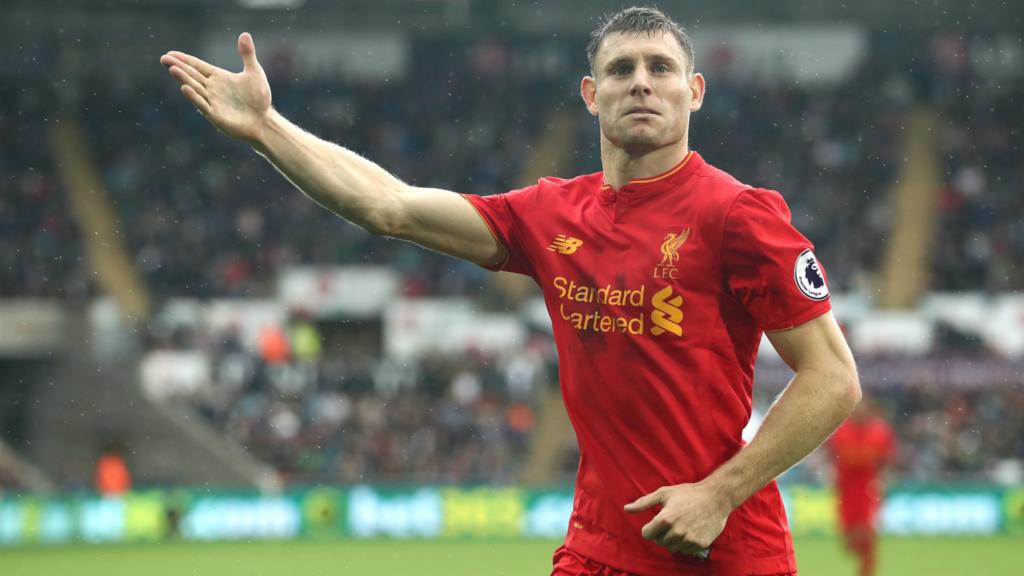 James Milner celebrates