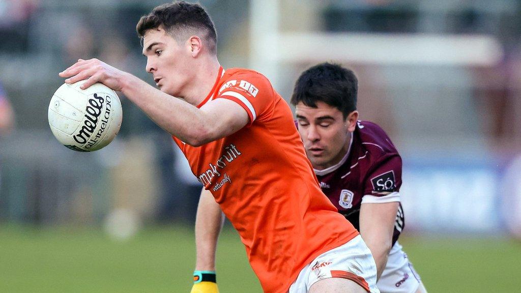 Galway skipper Sean Kelly struggles to keep pace with Armagh's Jarlath Og Burns