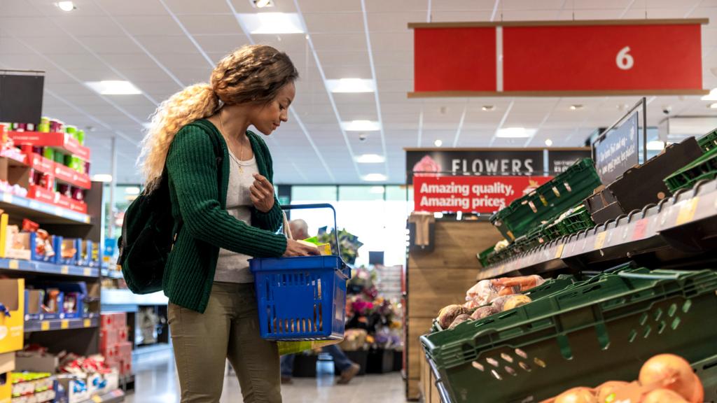 A woman shops in a supermarket