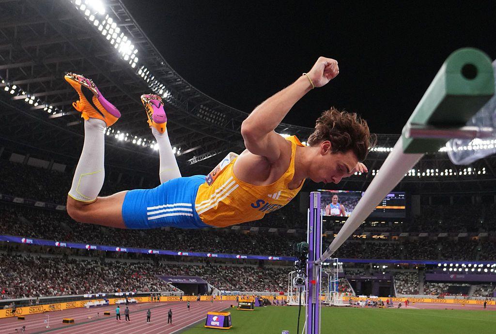 Armand Duplantis clears the bar to set a new world record in Tokyo