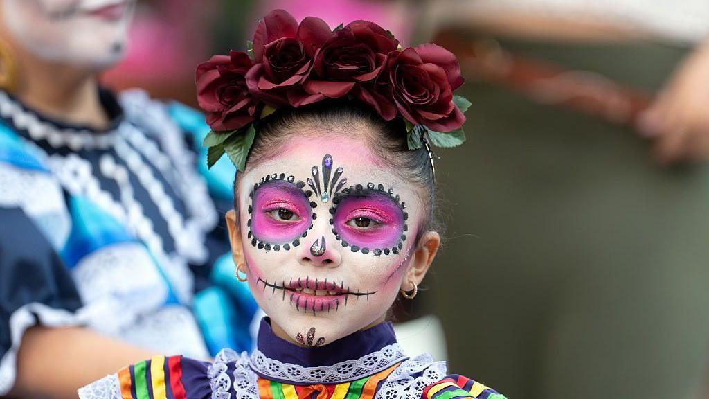 girl with day of the dead facepaint