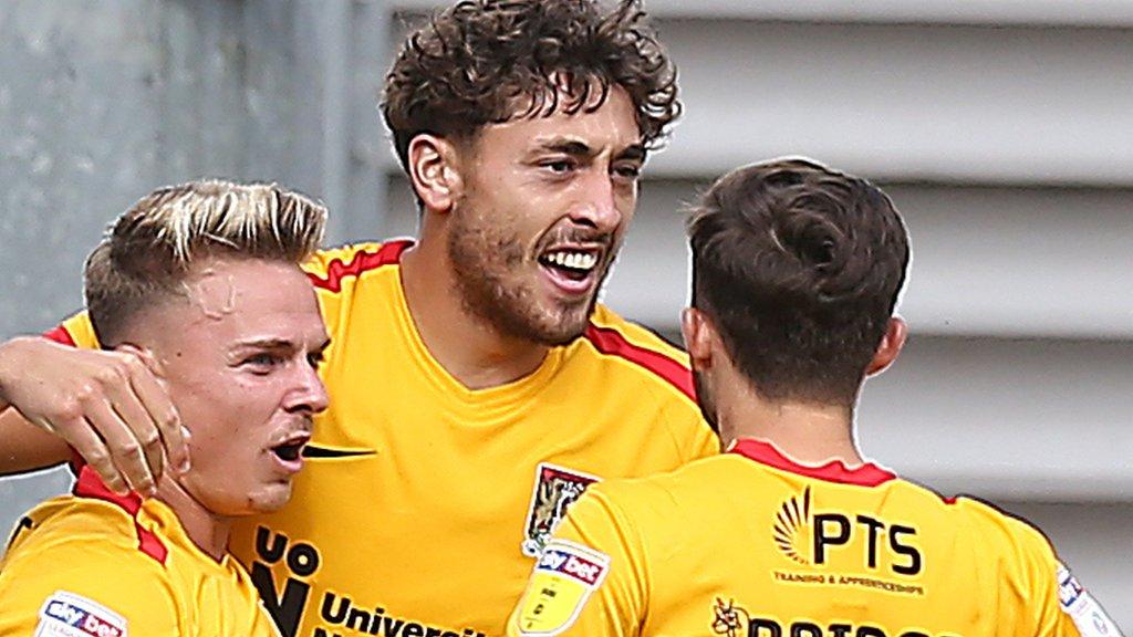 Northampton's Matt Crooks (centre) celebrates a goal