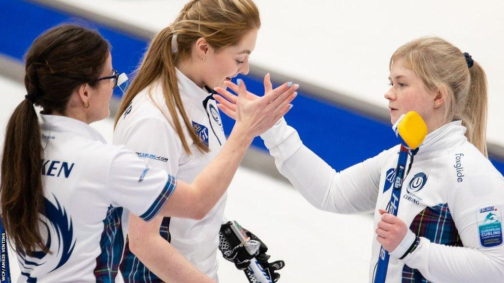 Rebecca Morrison (centre) and her team celebrate