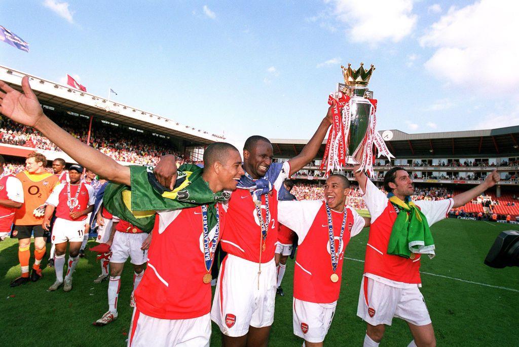 Arsenal captain Patrick Vieira lifts the Premier League trophy aloft