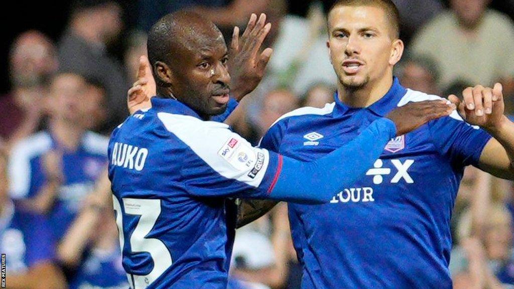 Sone Aluko celebrates scoring Ipswich's second goal