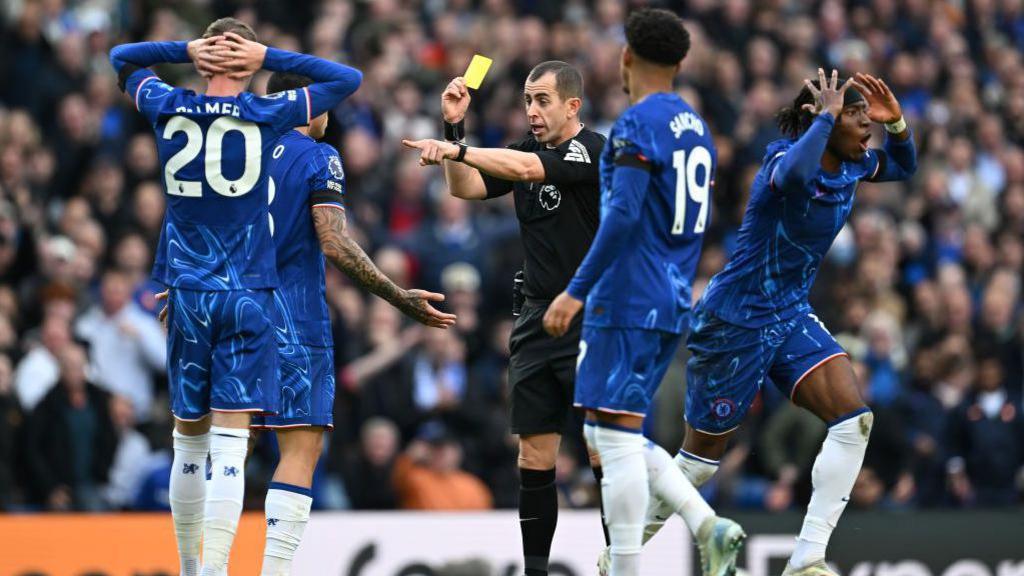 Chelsea react to a yellow card against Nottingham Forest