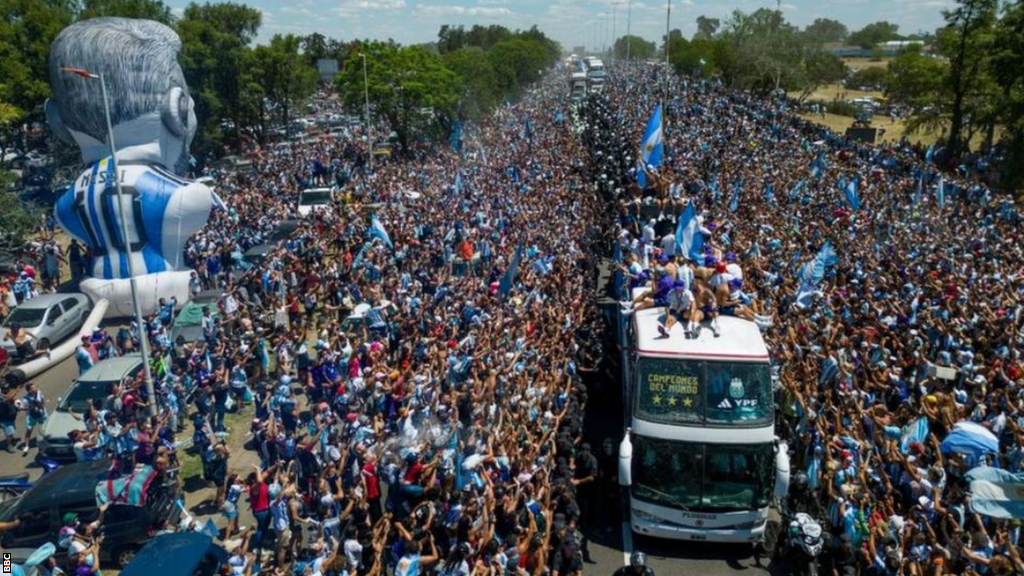 Millions of ecstatic fans took to the streets Buenos Aires to welcome Argentina's World Cup men's winning team back home