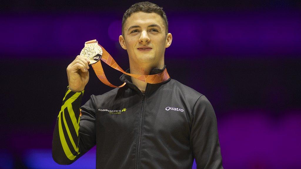 Rhys McClenaghan with his gold medal at the World Championships in Liverpool