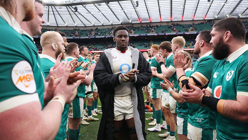 Maro Itoje is applauded by the Ireland players