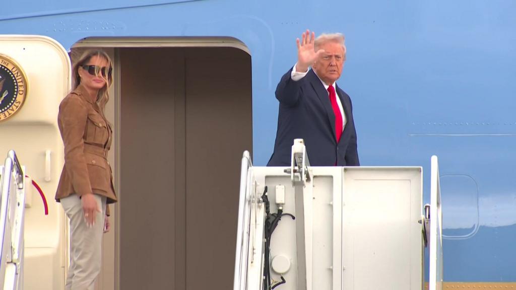 Melania and Donald Trump board Air Force One