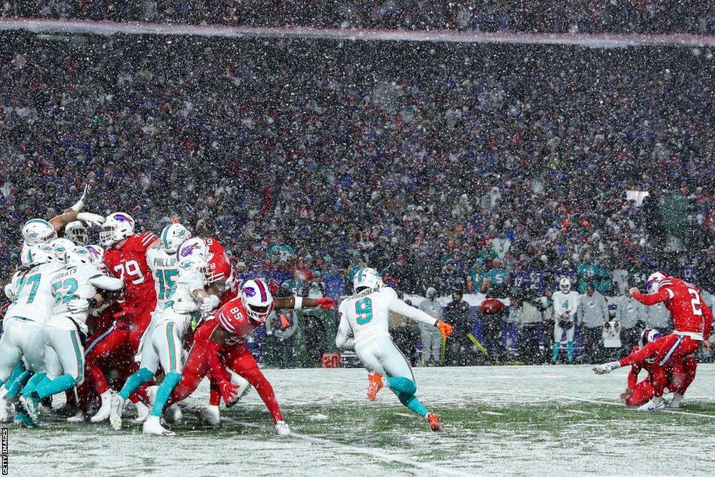 Tyler Bass kicks a game-winning field goal for the Buffalo Bills against the Miami Dolphins