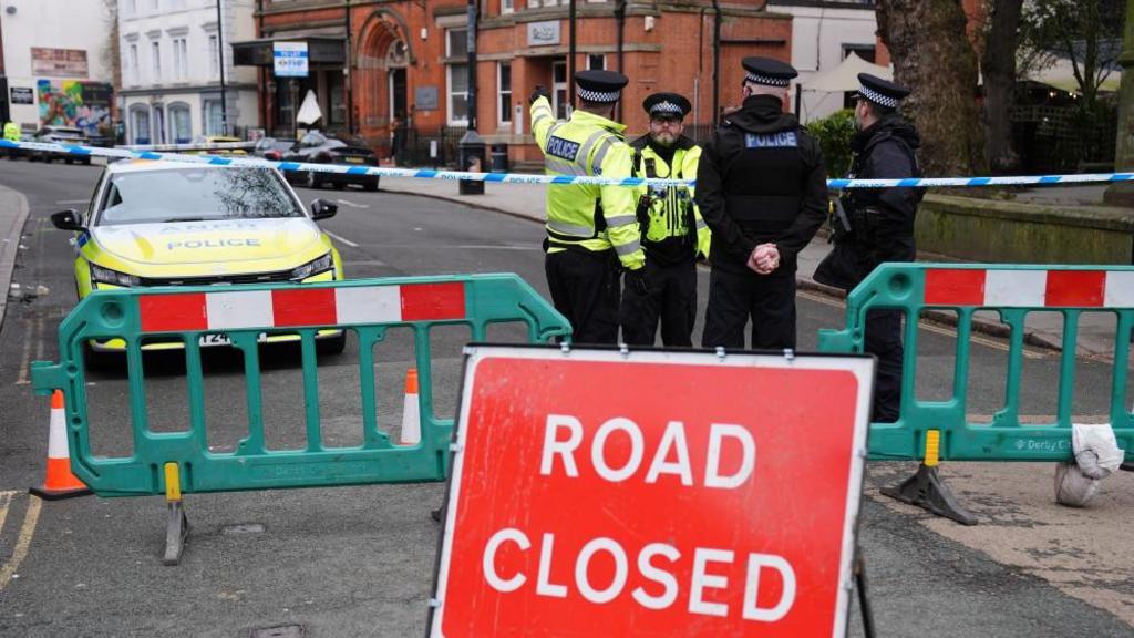 Police cordon near to the scene in Friar Gate, Derby.