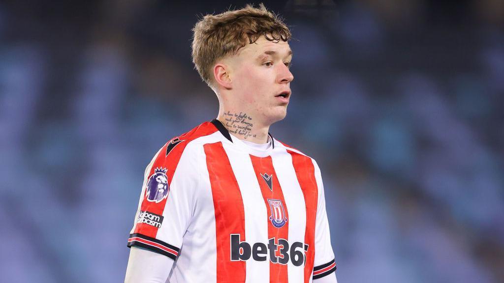 Christy Grogan in action for his previous club Stoke City in their U21's side