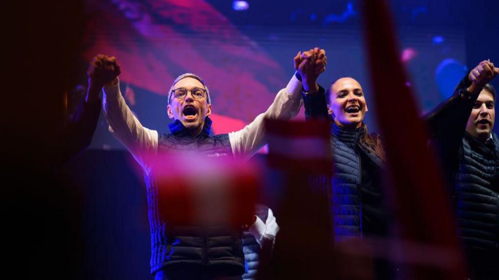 Herbert Kickl, lead candidate of the far-right Austria Freedom Party (FPOe), cheers at an FPOe election rally ahead of Austrian parliamentary elections on September 27, 2024 in Vienna, Austria. 