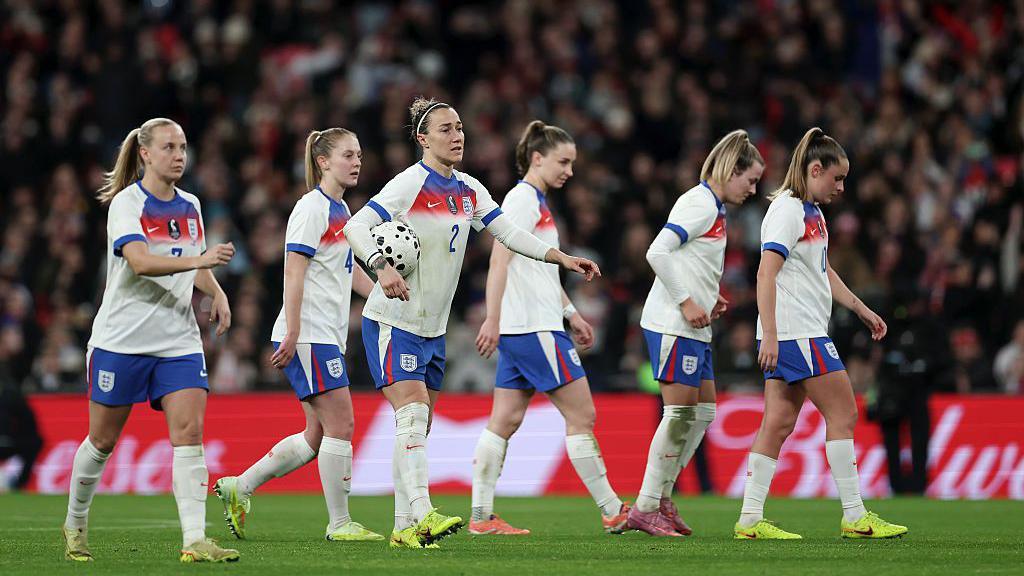 The Lionesses disburse from a huddle