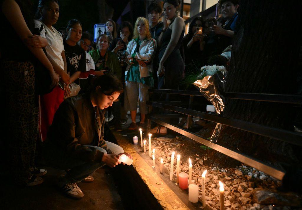 Fans pay tribute to Liam Payne outside the hotel where he died in Argentina