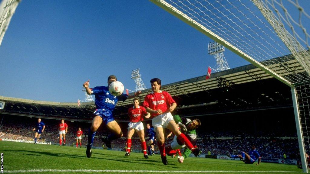 Nottingham Forest and Oldham players watch as Steve Sutton saves a shot and denies the Latics