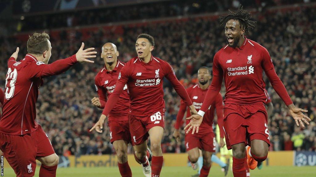 Divock Origi celebrates scoring the fourth Liverpool goal during the Liverpool v Barcelona Champions League semi-final second leg at Anfield on 7 May 2019