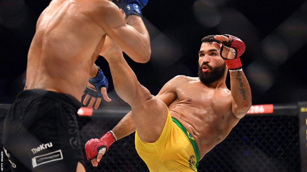 Patricio 'Pitbull' Freire throws a kick at Adam Borics during their fight in October