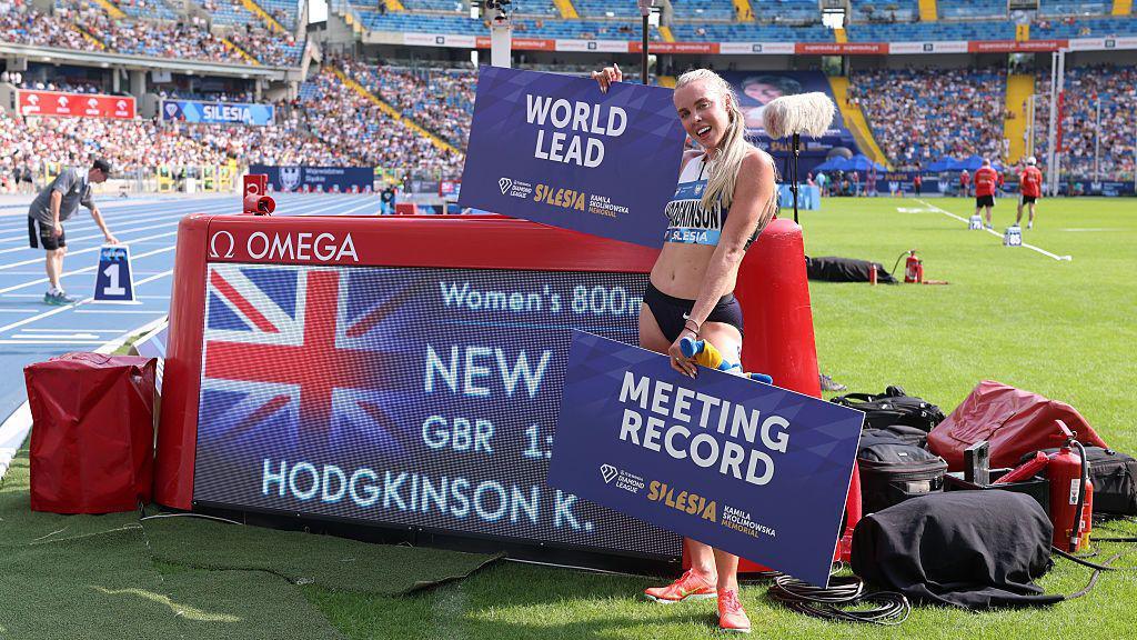 Keely Hodgkinson celebrates winning in Silesia with world lead and meeting record placards