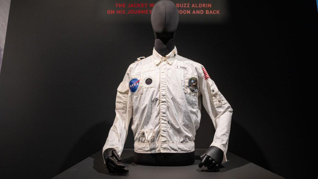Buzz Aldrin's Inflight Coverall Jacket during the Apollo 11 on a mannequin against a black background